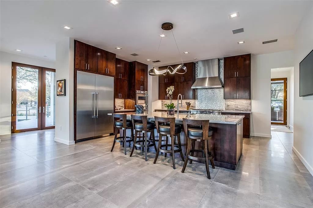 17214 Club Hill Drive, Dallas, Texas is a modern masterpiece perfectly situated with pristine views of both the Bent Tree & Preston Trail Golf courses along with its picturesque view of White Rock Creek.