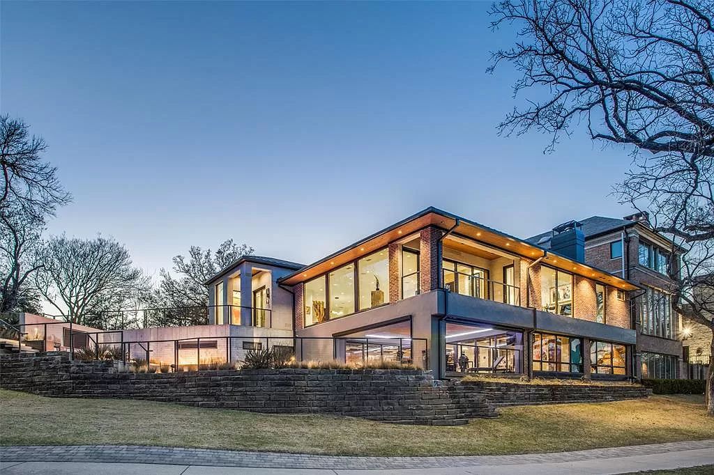 17214 Club Hill Drive, Dallas, Texas is a modern masterpiece perfectly situated with pristine views of both the Bent Tree & Preston Trail Golf courses along with its picturesque view of White Rock Creek.