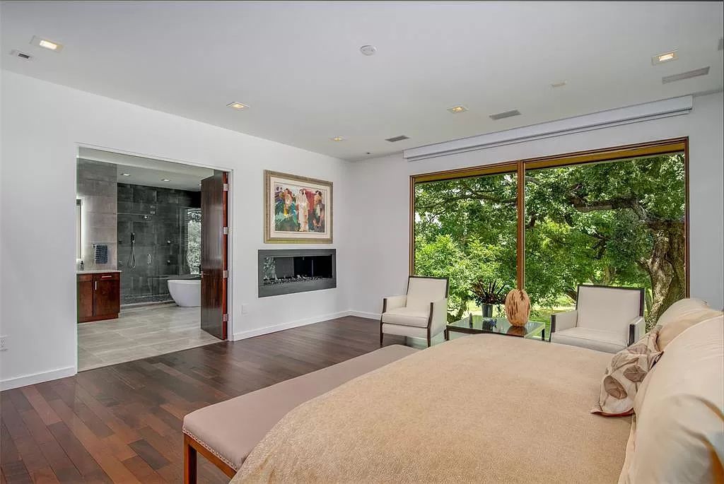 17214 Club Hill Drive, Dallas, Texas is a modern masterpiece perfectly situated with pristine views of both the Bent Tree & Preston Trail Golf courses along with its picturesque view of White Rock Creek.