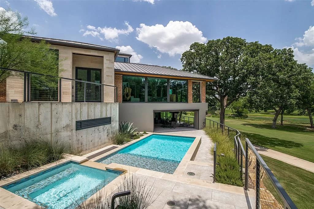 17214 Club Hill Drive, Dallas, Texas is a modern masterpiece perfectly situated with pristine views of both the Bent Tree & Preston Trail Golf courses along with its picturesque view of White Rock Creek.