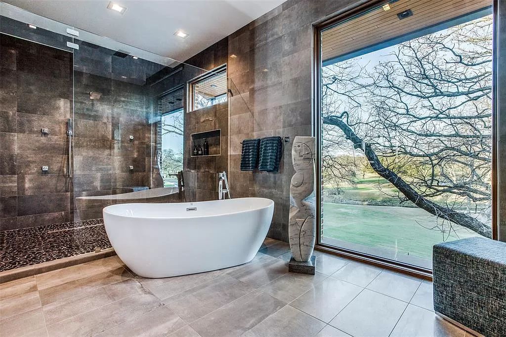 17214 Club Hill Drive, Dallas, Texas is a modern masterpiece perfectly situated with pristine views of both the Bent Tree & Preston Trail Golf courses along with its picturesque view of White Rock Creek.