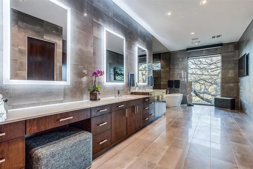 17214 Club Hill Drive, Dallas, Texas is a modern masterpiece perfectly situated with pristine views of both the Bent Tree & Preston Trail Golf courses along with its picturesque view of White Rock Creek.