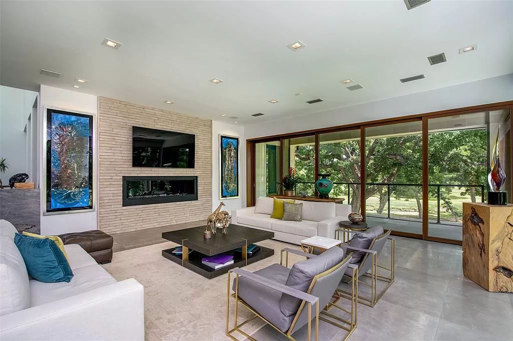 17214 Club Hill Drive, Dallas, Texas is a modern masterpiece perfectly situated with pristine views of both the Bent Tree & Preston Trail Golf courses along with its picturesque view of White Rock Creek.