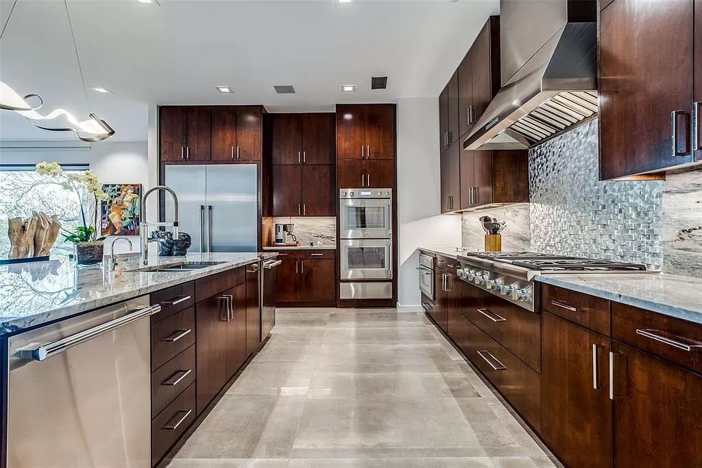 17214 Club Hill Drive, Dallas, Texas is a modern masterpiece perfectly situated with pristine views of both the Bent Tree & Preston Trail Golf courses along with its picturesque view of White Rock Creek.