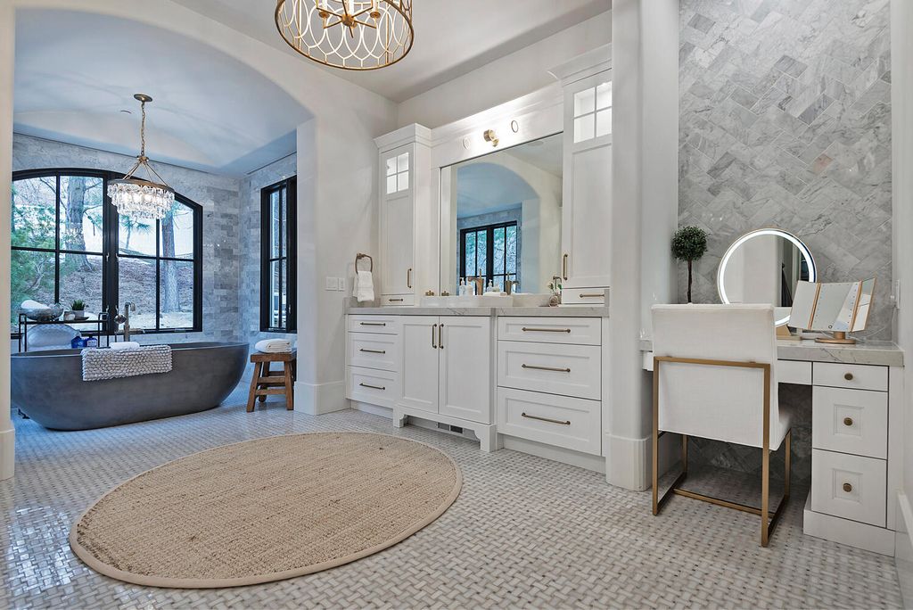 The Estate in Sandy is a luxurious home that has undergone a throughout extensive remodel now available for sale. This home located at 3271 E Deer Hollow Dr S, Sandy, Utah; offering 05 bedrooms and 11 bathrooms with 12,931 square feet of living spaces.