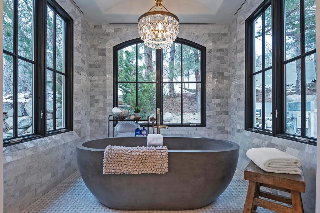 The Estate in Sandy is a luxurious home that has undergone a throughout extensive remodel now available for sale. This home located at 3271 E Deer Hollow Dr S, Sandy, Utah; offering 05 bedrooms and 11 bathrooms with 12,931 square feet of living spaces.