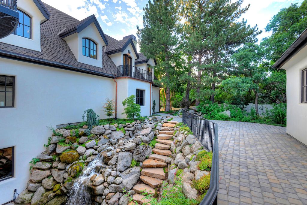 The Estate in Sandy is a luxurious home that has undergone a throughout extensive remodel now available for sale. This home located at 3271 E Deer Hollow Dr S, Sandy, Utah; offering 05 bedrooms and 11 bathrooms with 12,931 square feet of living spaces.