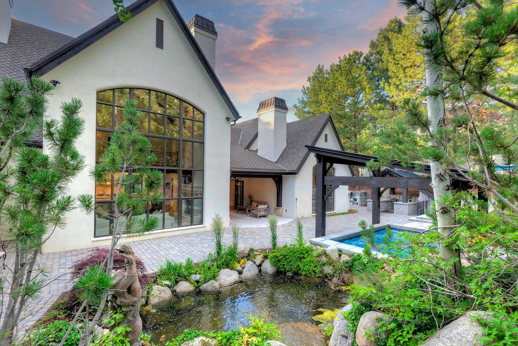 The Estate in Sandy is a luxurious home that has undergone a throughout extensive remodel now available for sale. This home located at 3271 E Deer Hollow Dr S, Sandy, Utah; offering 05 bedrooms and 11 bathrooms with 12,931 square feet of living spaces.