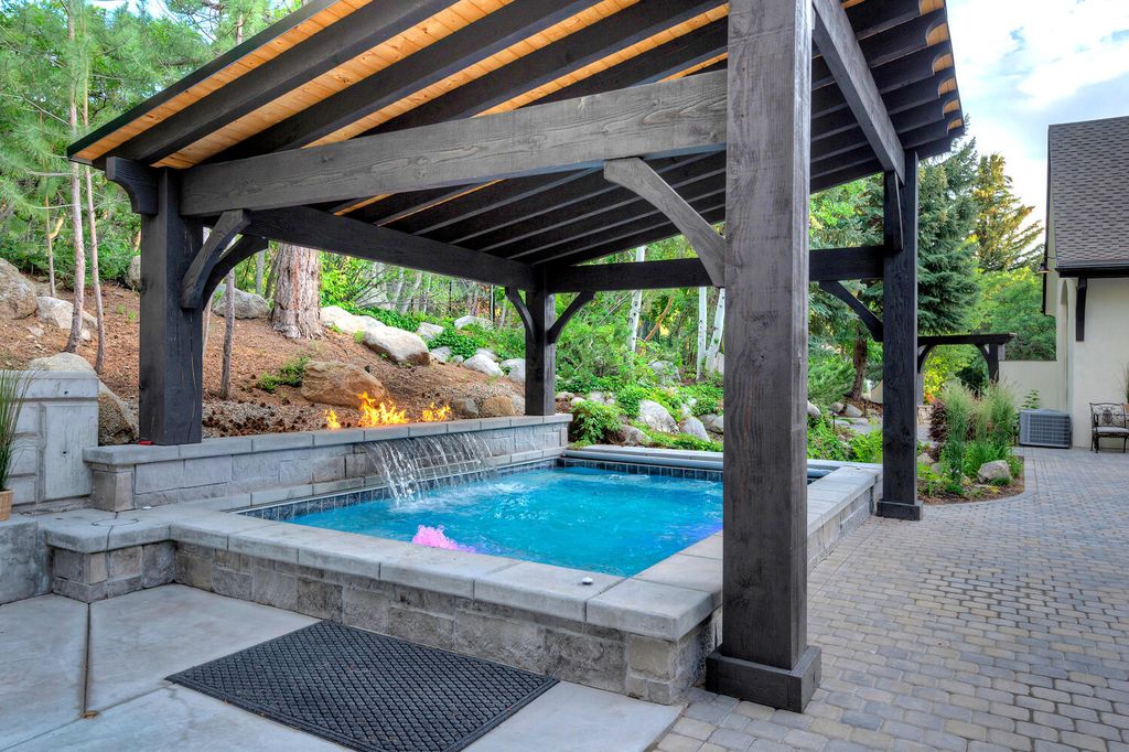 The Estate in Sandy is a luxurious home that has undergone a throughout extensive remodel now available for sale. This home located at 3271 E Deer Hollow Dr S, Sandy, Utah; offering 05 bedrooms and 11 bathrooms with 12,931 square feet of living spaces.