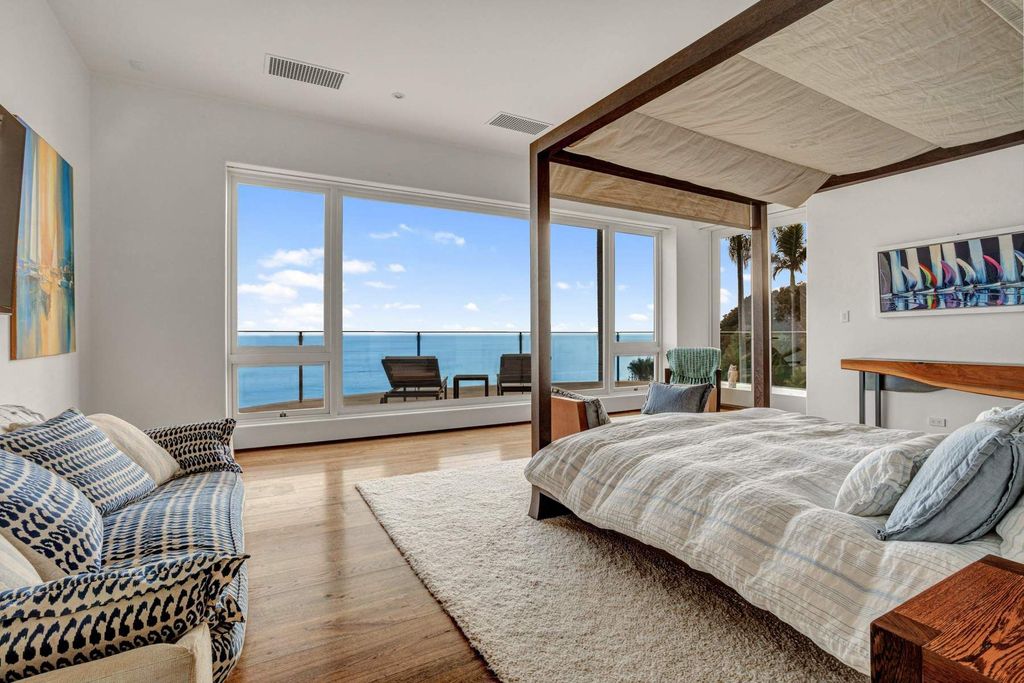 The Estate in Malibu, an exceptional property on the bluffs of the world-renowned Paradise Cove Beach offers destination resort-style living with a gorgeous infinity pool, a tennis court, outdoor barbeque and pizza oven and more is now available for sale. This home located at 28060 Sea Lane Dr, Malibu, California