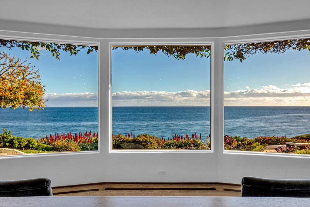 The Estate in Malibu, an exceptional property on the bluffs of the world-renowned Paradise Cove Beach offers destination resort-style living with a gorgeous infinity pool, a tennis court, outdoor barbeque and pizza oven and more is now available for sale. This home located at 28060 Sea Lane Dr, Malibu, California