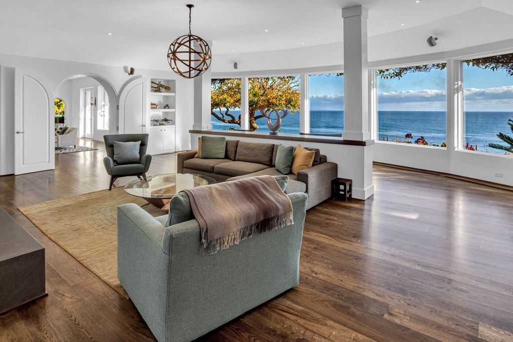 The Estate in Malibu, an exceptional property on the bluffs of the world-renowned Paradise Cove Beach offers destination resort-style living with a gorgeous infinity pool, a tennis court, outdoor barbeque and pizza oven and more is now available for sale. This home located at 28060 Sea Lane Dr, Malibu, California