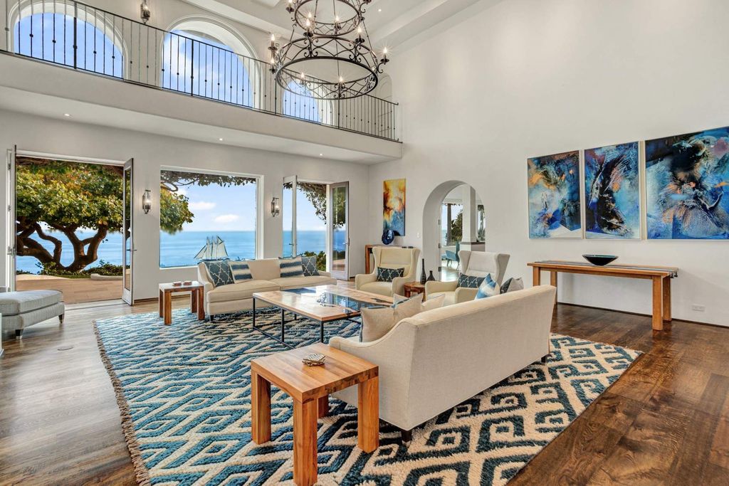 The Estate in Malibu, an exceptional property on the bluffs of the world-renowned Paradise Cove Beach offers destination resort-style living with a gorgeous infinity pool, a tennis court, outdoor barbeque and pizza oven and more is now available for sale. This home located at 28060 Sea Lane Dr, Malibu, California