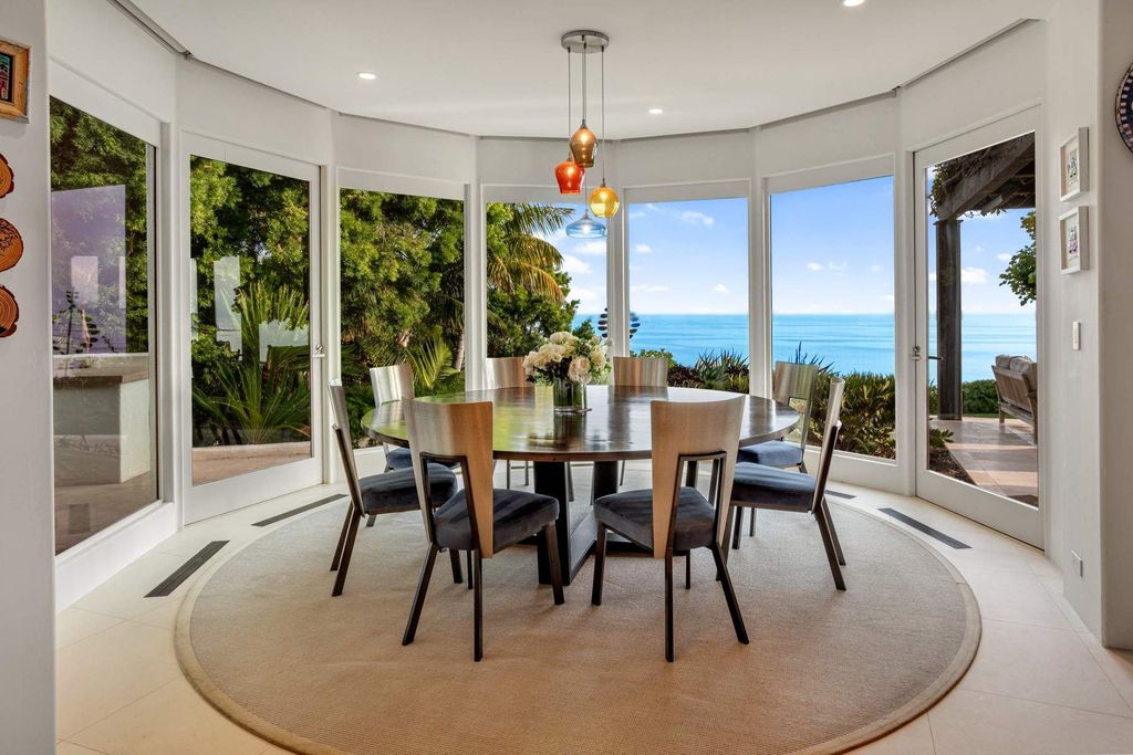 The Estate in Malibu, an exceptional property on the bluffs of the world-renowned Paradise Cove Beach offers destination resort-style living with a gorgeous infinity pool, a tennis court, outdoor barbeque and pizza oven and more is now available for sale. This home located at 28060 Sea Lane Dr, Malibu, California