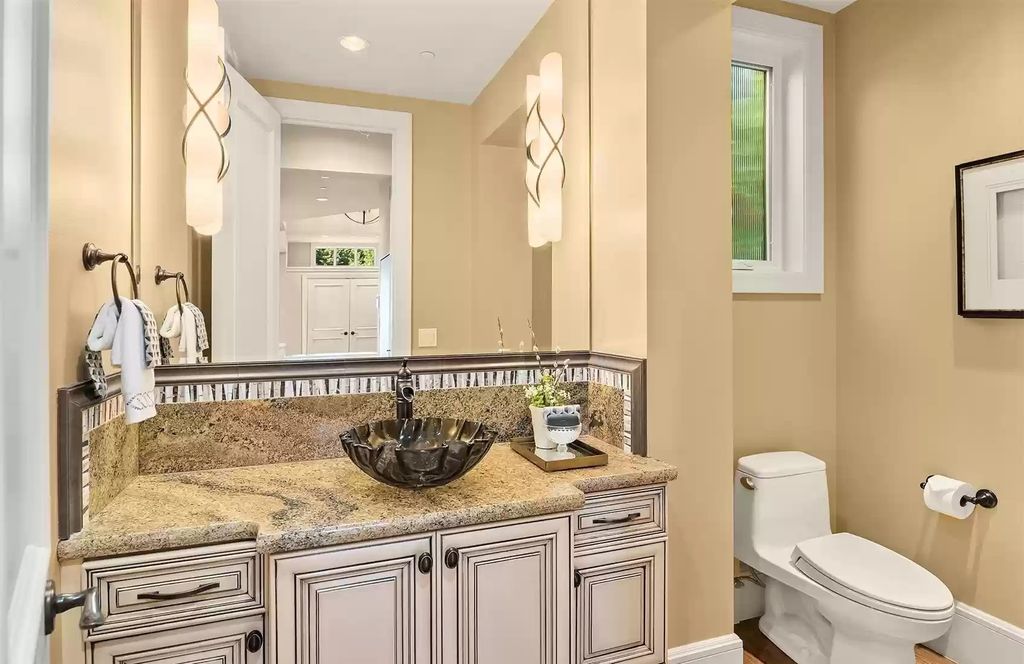 The Estate in Bellevue is a luxurious home built to entertain with a movie theatre, great room, wine cellar, recreation room, and a full bar now available for sale. This home located at 1044 89th Avenue NE, Bellevue, Washington; offering 05 bedrooms and 07 bathrooms with 6,054 square feet of living spaces.