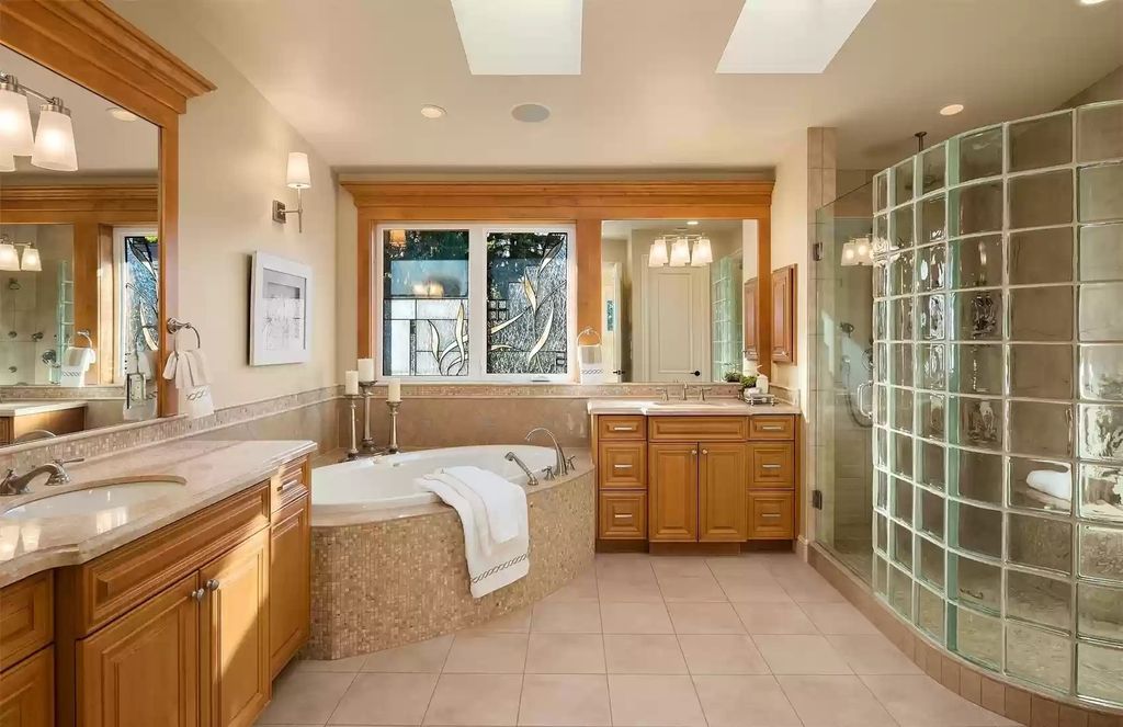 The Estate in Bellevue is a luxurious home built to entertain with a movie theatre, great room, wine cellar, recreation room, and a full bar now available for sale. This home located at 1044 89th Avenue NE, Bellevue, Washington; offering 05 bedrooms and 07 bathrooms with 6,054 square feet of living spaces.
