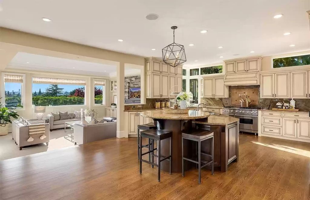 The Estate in Bellevue is a luxurious home built to entertain with a movie theatre, great room, wine cellar, recreation room, and a full bar now available for sale. This home located at 1044 89th Avenue NE, Bellevue, Washington; offering 05 bedrooms and 07 bathrooms with 6,054 square feet of living spaces.