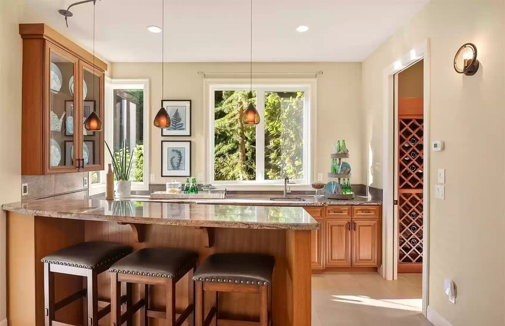 The Estate in Bellevue is a luxurious home built to entertain with a movie theatre, great room, wine cellar, recreation room, and a full bar now available for sale. This home located at 1044 89th Avenue NE, Bellevue, Washington; offering 05 bedrooms and 07 bathrooms with 6,054 square feet of living spaces.