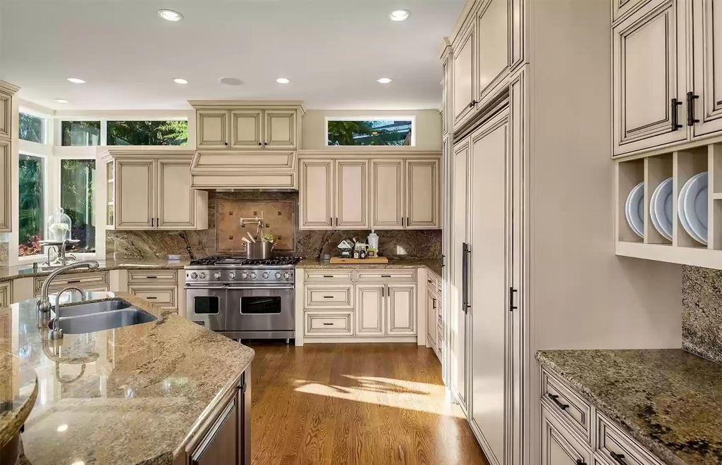 The Estate in Bellevue is a luxurious home built to entertain with a movie theatre, great room, wine cellar, recreation room, and a full bar now available for sale. This home located at 1044 89th Avenue NE, Bellevue, Washington; offering 05 bedrooms and 07 bathrooms with 6,054 square feet of living spaces.
