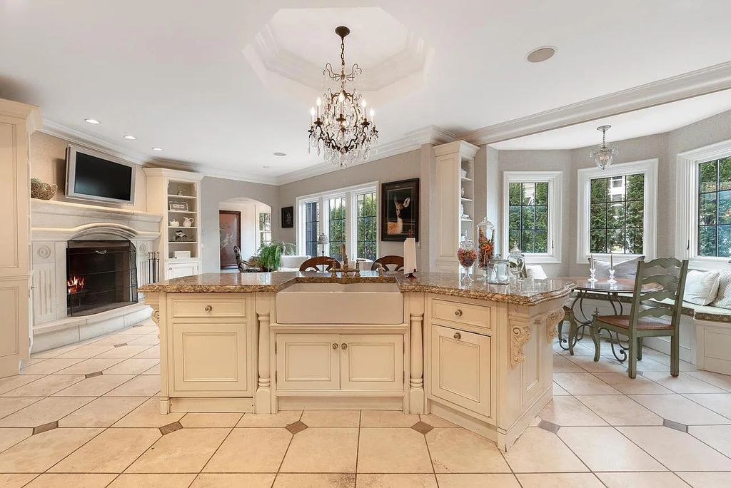 The Mansion in Shorewood offers beautiful backyard with outdoor granite Kit, pergola dining area and Firepit, now available for sale. This home located at 4496 North Lake Dr, Shorewood, Wisconsin
