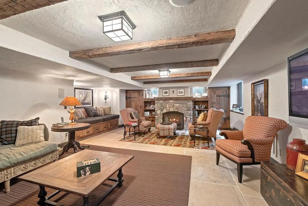 The Mansion in Shorewood offers beautiful backyard with outdoor granite Kit, pergola dining area and Firepit, now available for sale. This home located at 4496 North Lake Dr, Shorewood, Wisconsin