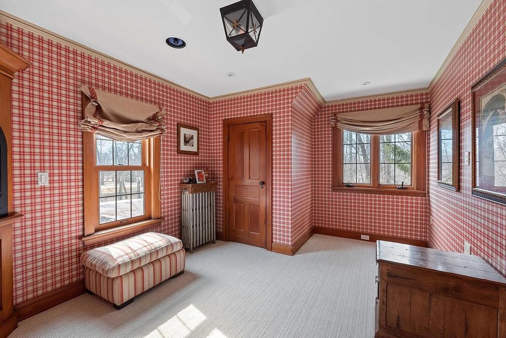 The Mansion in Shorewood offers beautiful backyard with outdoor granite Kit, pergola dining area and Firepit, now available for sale. This home located at 4496 North Lake Dr, Shorewood, Wisconsin