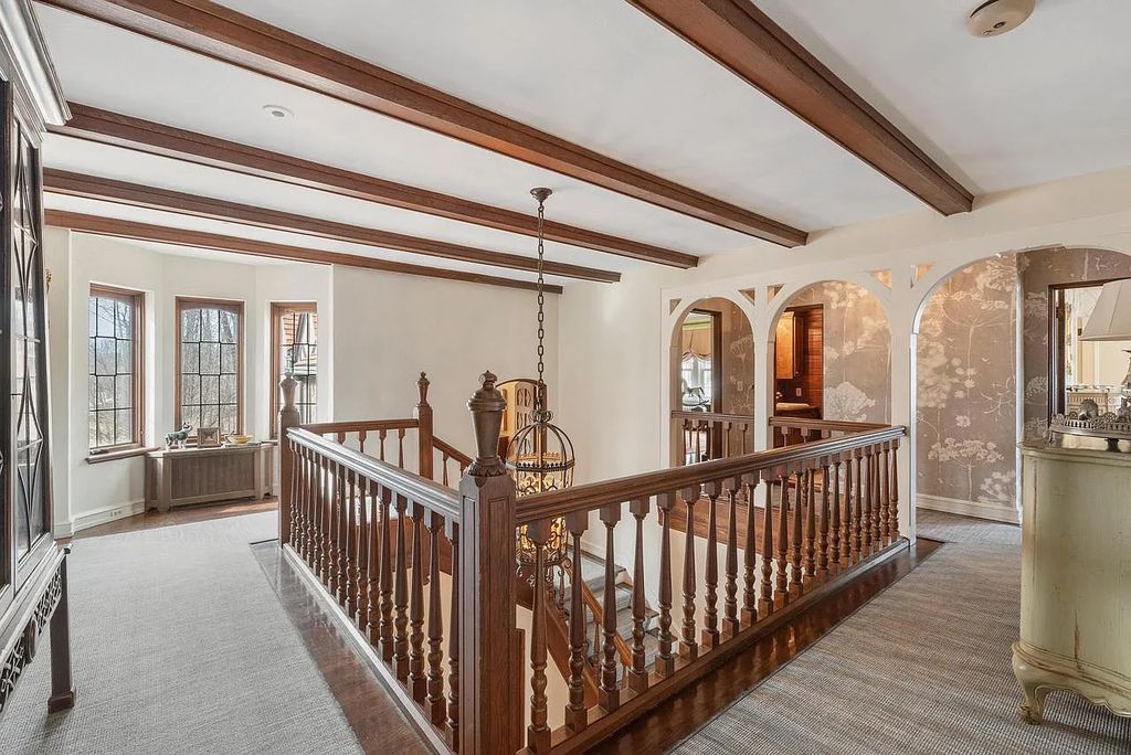 The Mansion in Shorewood offers beautiful backyard with outdoor granite Kit, pergola dining area and Firepit, now available for sale. This home located at 4496 North Lake Dr, Shorewood, Wisconsin