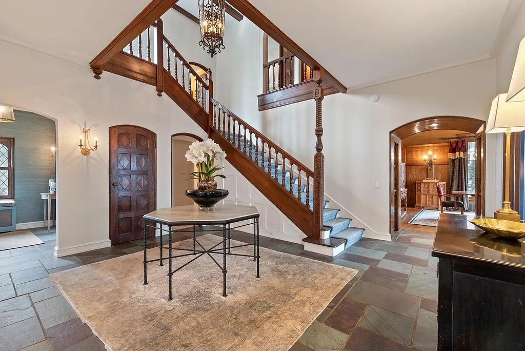 The Mansion in Shorewood offers beautiful backyard with outdoor granite Kit, pergola dining area and Firepit, now available for sale. This home located at 4496 North Lake Dr, Shorewood, Wisconsin