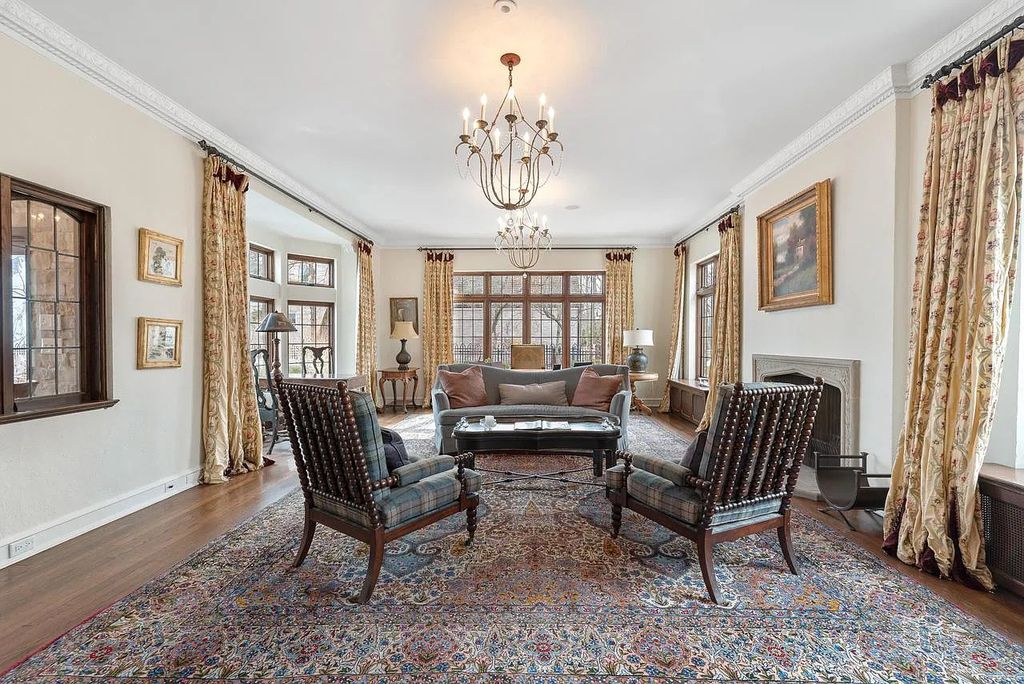 The Mansion in Shorewood offers beautiful backyard with outdoor granite Kit, pergola dining area and Firepit, now available for sale. This home located at 4496 North Lake Dr, Shorewood, Wisconsin