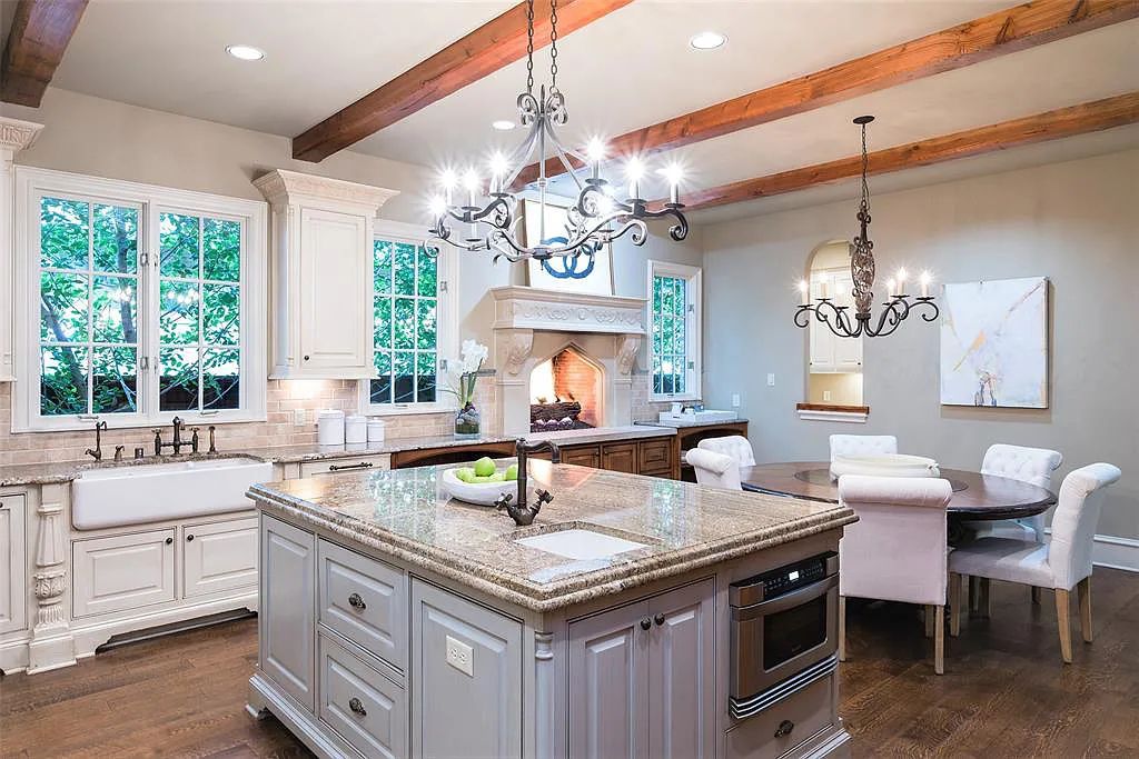 3837 Greenbrier Drive, Dallas, Texas is a fabulous property in the middle of the fairway between 2 parks with features includes top-of-the-line Chefs kitchen, bed en-suites, large game room, heated pool, elevator, front yard stone entertaining terrace, designated dog run and more.