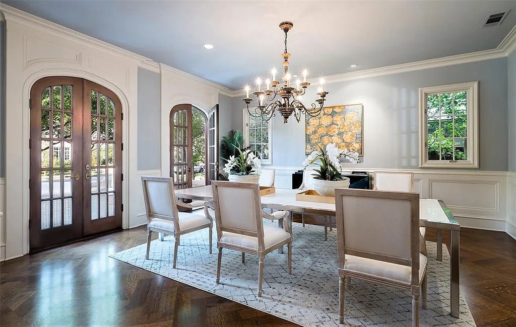 3837 Greenbrier Drive, Dallas, Texas is a fabulous property in the middle of the fairway between 2 parks with features includes top-of-the-line Chefs kitchen, bed en-suites, large game room, heated pool, elevator, front yard stone entertaining terrace, designated dog run and more.