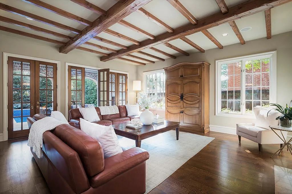 3837 Greenbrier Drive, Dallas, Texas is a fabulous property in the middle of the fairway between 2 parks with features includes top-of-the-line Chefs kitchen, bed en-suites, large game room, heated pool, elevator, front yard stone entertaining terrace, designated dog run and more.