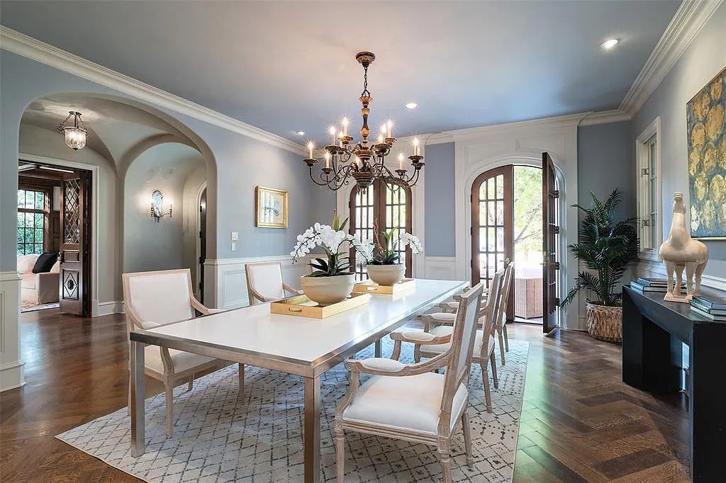 3837 Greenbrier Drive, Dallas, Texas is a fabulous property in the middle of the fairway between 2 parks with features includes top-of-the-line Chefs kitchen, bed en-suites, large game room, heated pool, elevator, front yard stone entertaining terrace, designated dog run and more.