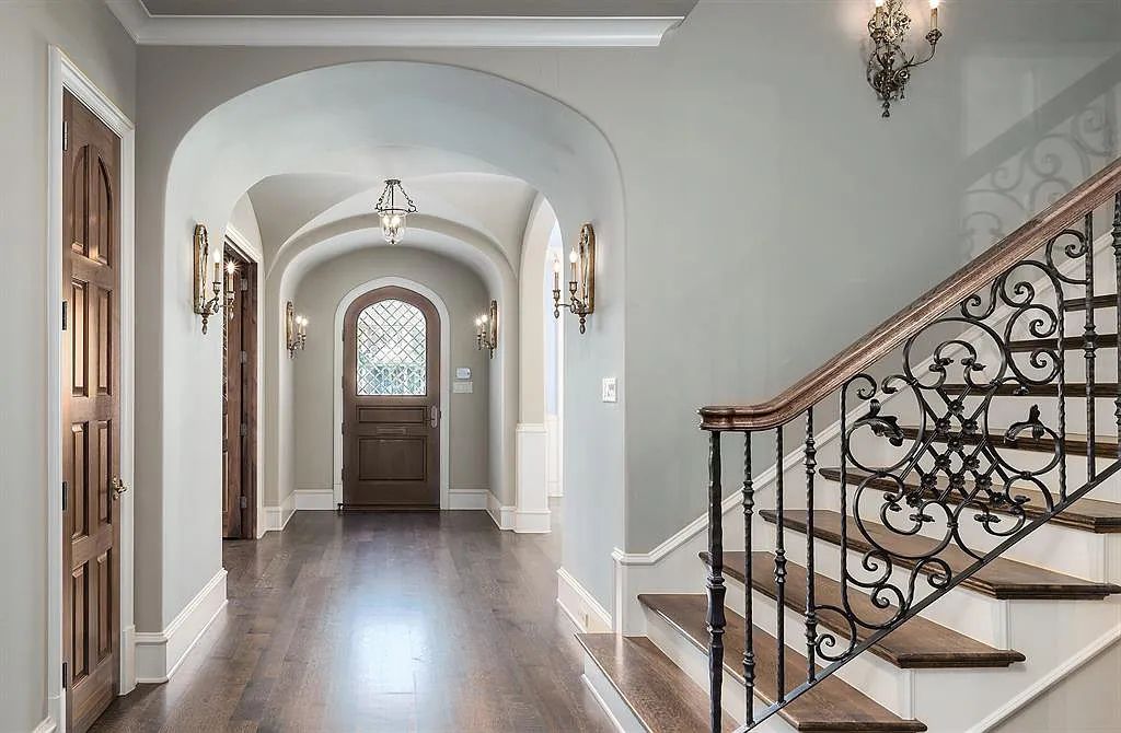 3837 Greenbrier Drive, Dallas, Texas is a fabulous property in the middle of the fairway between 2 parks with features includes top-of-the-line Chefs kitchen, bed en-suites, large game room, heated pool, elevator, front yard stone entertaining terrace, designated dog run and more.