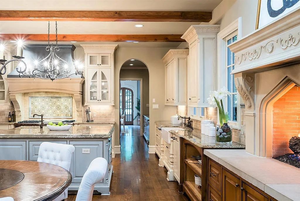 3837 Greenbrier Drive, Dallas, Texas is a fabulous property in the middle of the fairway between 2 parks with features includes top-of-the-line Chefs kitchen, bed en-suites, large game room, heated pool, elevator, front yard stone entertaining terrace, designated dog run and more.