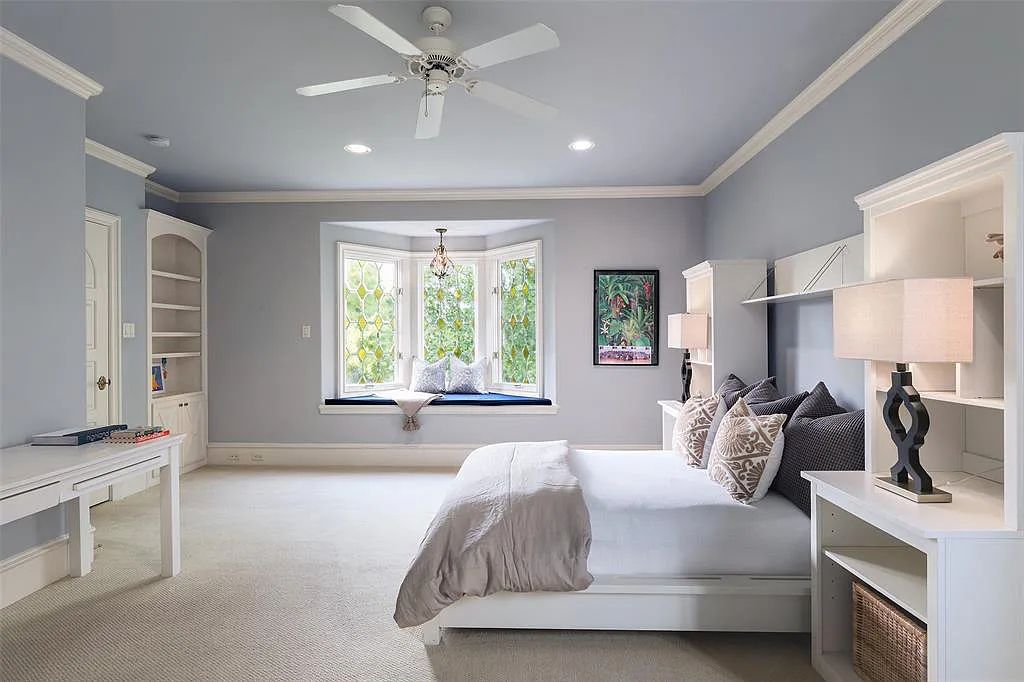 3837 Greenbrier Drive, Dallas, Texas is a fabulous property in the middle of the fairway between 2 parks with features includes top-of-the-line Chefs kitchen, bed en-suites, large game room, heated pool, elevator, front yard stone entertaining terrace, designated dog run and more.