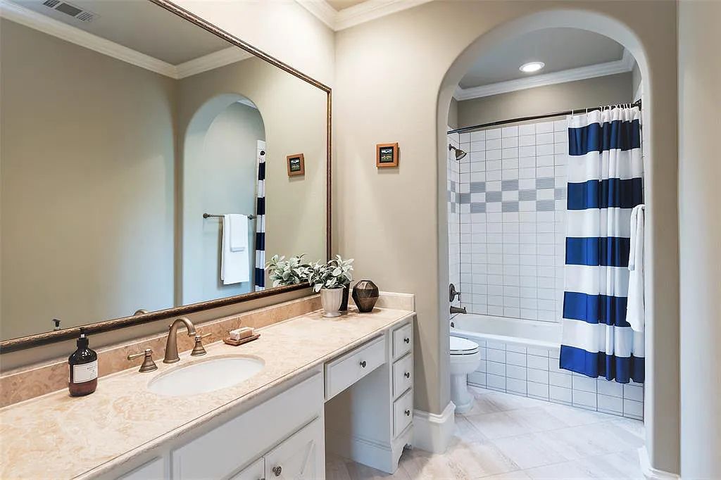 3837 Greenbrier Drive, Dallas, Texas is a fabulous property in the middle of the fairway between 2 parks with features includes top-of-the-line Chefs kitchen, bed en-suites, large game room, heated pool, elevator, front yard stone entertaining terrace, designated dog run and more.