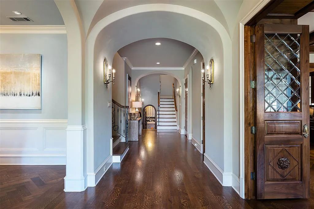 3837 Greenbrier Drive, Dallas, Texas is a fabulous property in the middle of the fairway between 2 parks with features includes top-of-the-line Chefs kitchen, bed en-suites, large game room, heated pool, elevator, front yard stone entertaining terrace, designated dog run and more.
