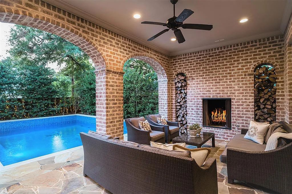 3837 Greenbrier Drive, Dallas, Texas is a fabulous property in the middle of the fairway between 2 parks with features includes top-of-the-line Chefs kitchen, bed en-suites, large game room, heated pool, elevator, front yard stone entertaining terrace, designated dog run and more.
