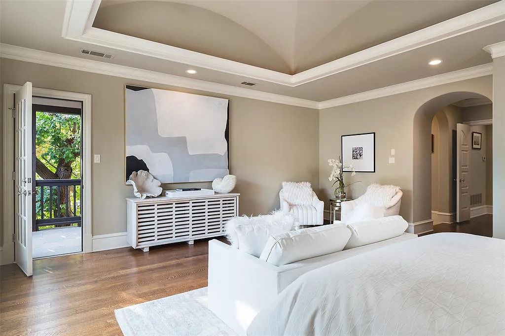 3837 Greenbrier Drive, Dallas, Texas is a fabulous property in the middle of the fairway between 2 parks with features includes top-of-the-line Chefs kitchen, bed en-suites, large game room, heated pool, elevator, front yard stone entertaining terrace, designated dog run and more.