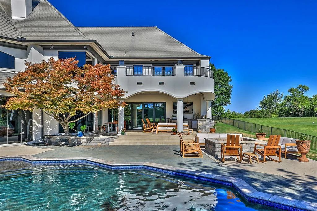 5801 Cypress Point Dr, Fort Worth, Texas is stunning remodeled estate in guarded and gated Mira Vista community on a cul-de-sac lot overlooking the 7th tee box, green and lake.