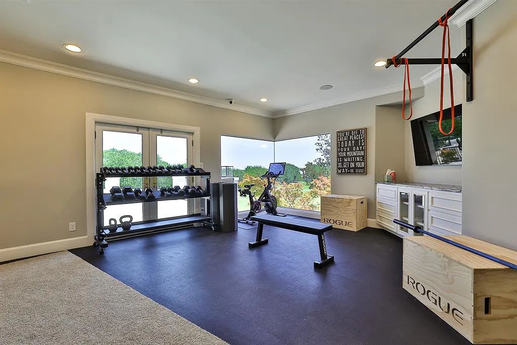 5801 Cypress Point Dr, Fort Worth, Texas is stunning remodeled estate in guarded and gated Mira Vista community on a cul-de-sac lot overlooking the 7th tee box, green and lake.