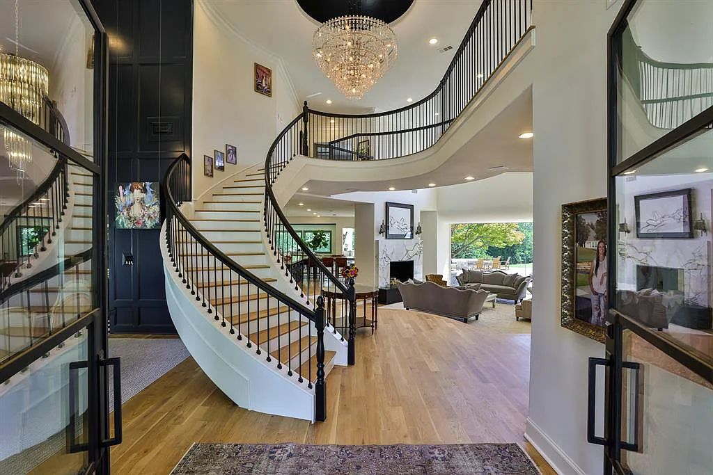 5801 Cypress Point Dr, Fort Worth, Texas is stunning remodeled estate in guarded and gated Mira Vista community on a cul-de-sac lot overlooking the 7th tee box, green and lake.