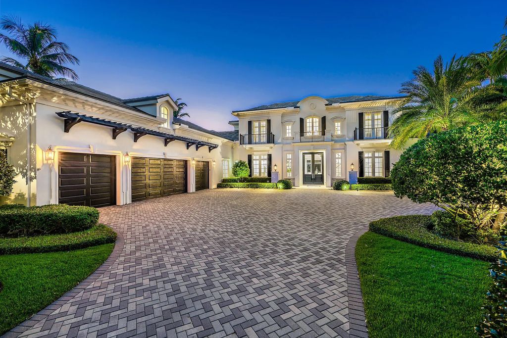 The Estate in Jupiter, a luxurious home on a quiet cul-de-sac street close to The Club features perfect outdoor living space including covered and screen outdoor living room with summer kitchen, fireplace, amazing water view pool is now available for sale. This home located at 109 Schooner Ln, Jupiter, Florida