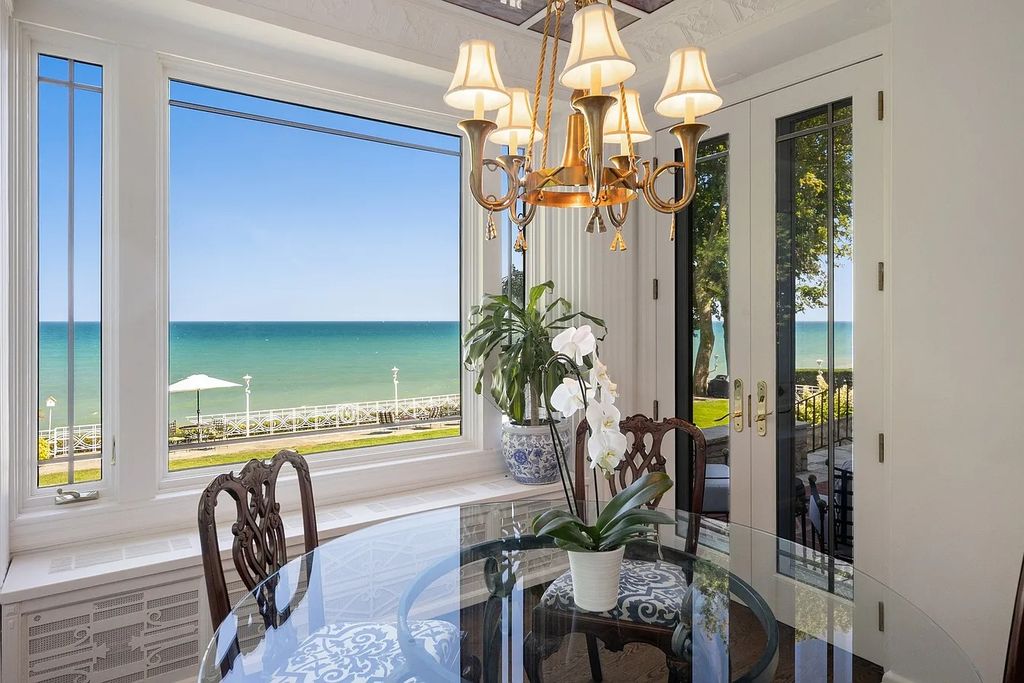 The Villa in Winnetka features incredible manicured resort level grounds accented with a full 2 story cabana house, now available for sale. This home located at 445 Sheridan Rd, Winnetka, Illinois