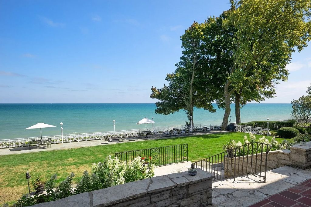 The Villa in Winnetka features incredible manicured resort level grounds accented with a full 2 story cabana house, now available for sale. This home located at 445 Sheridan Rd, Winnetka, Illinois