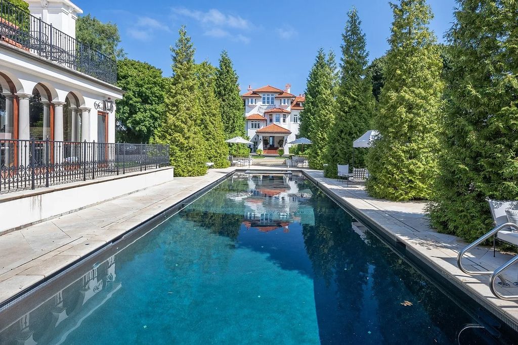 The Villa in Winnetka features incredible manicured resort level grounds accented with a full 2 story cabana house, now available for sale. This home located at 445 Sheridan Rd, Winnetka, Illinois