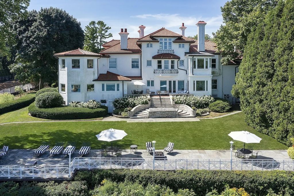 The Villa in Winnetka features incredible manicured resort level grounds accented with a full 2 story cabana house, now available for sale. This home located at 445 Sheridan Rd, Winnetka, Illinois