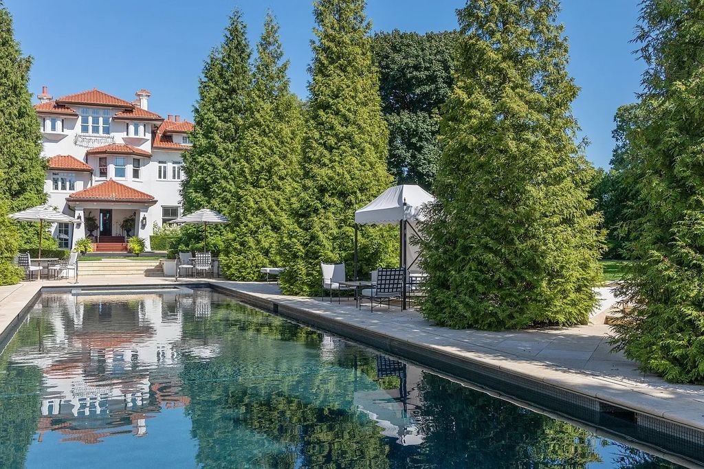 The Villa in Winnetka features incredible manicured resort level grounds accented with a full 2 story cabana house, now available for sale. This home located at 445 Sheridan Rd, Winnetka, Illinois
