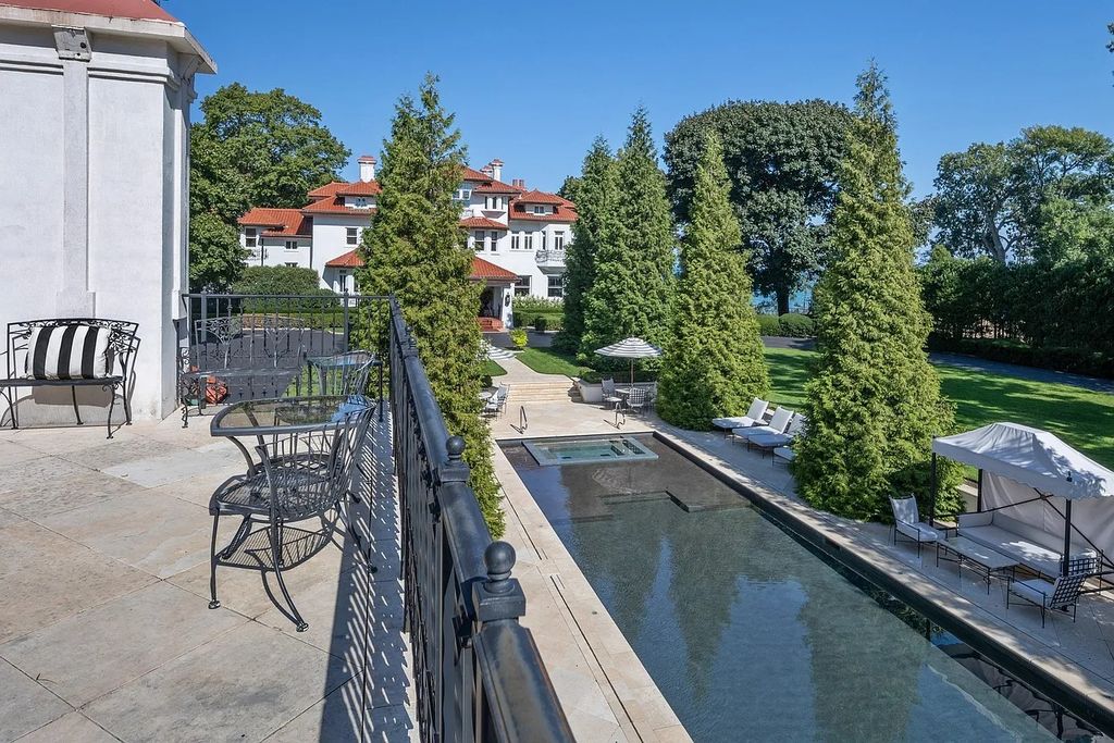 The Villa in Winnetka features incredible manicured resort level grounds accented with a full 2 story cabana house, now available for sale. This home located at 445 Sheridan Rd, Winnetka, Illinois